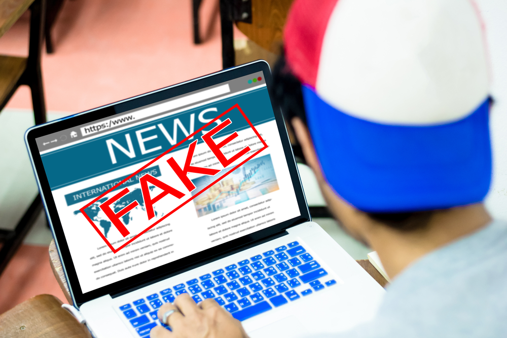 Laptop with fake news