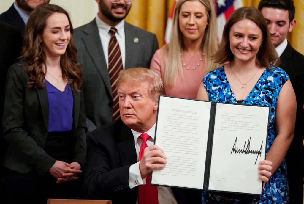 Trump holding signed executive order