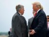 U.S. President Donald Trump speaks with the Governor of Missouri Mike Parson as he arrives in St. Louis, Missouri, U.S., July 26, 2018. REUTERS/Joshua Roberts