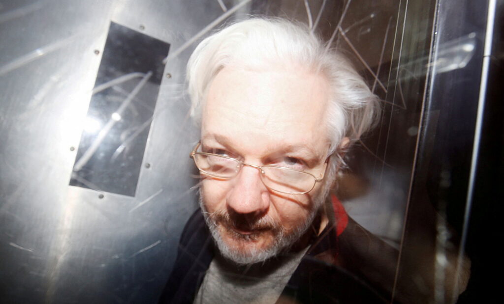 WikiLeaks founder Julian Assange leaves London's Westminster Magistrates Court in January 2020.