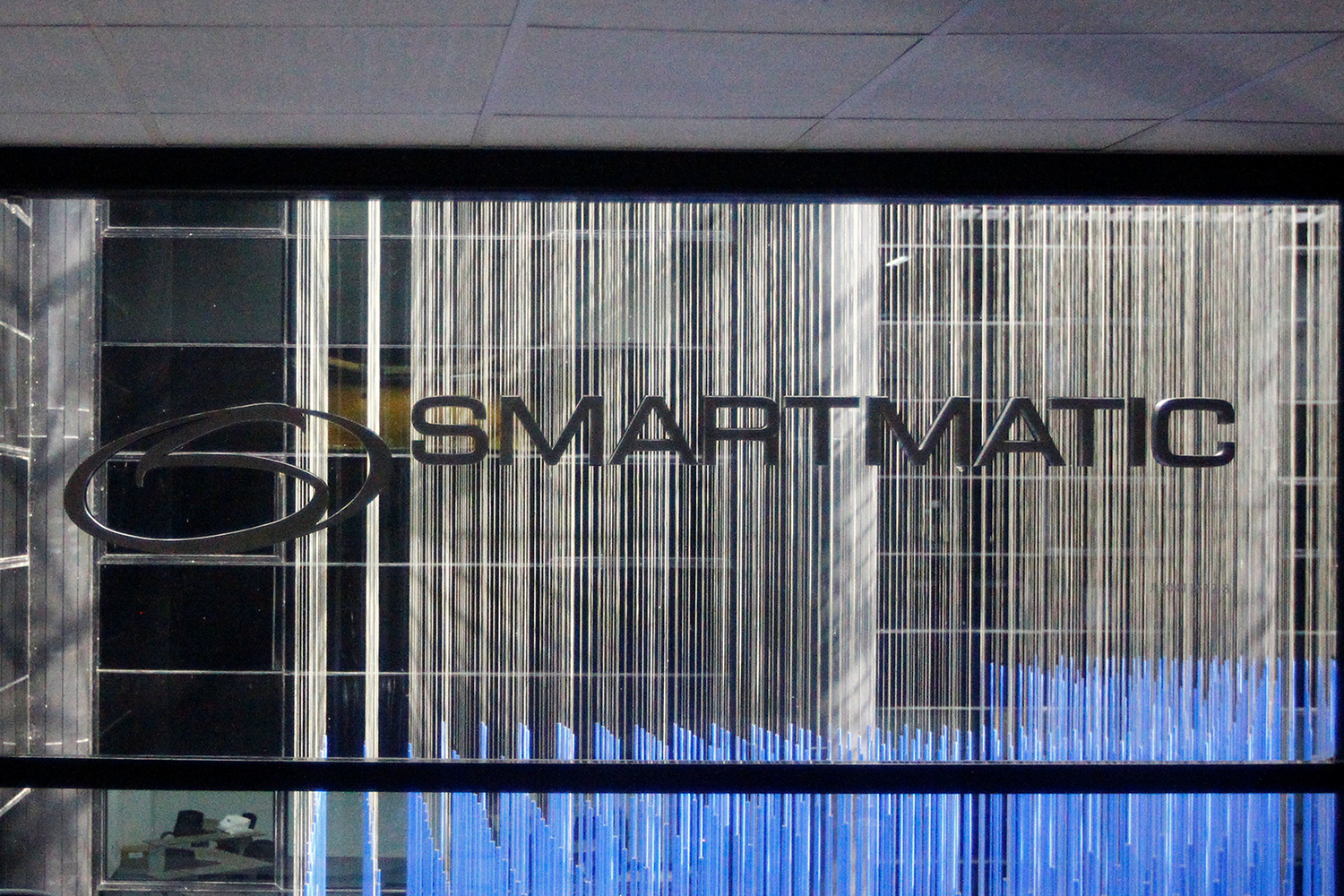 The corporate logo of Smartmatic is seen at its offices in Caracas