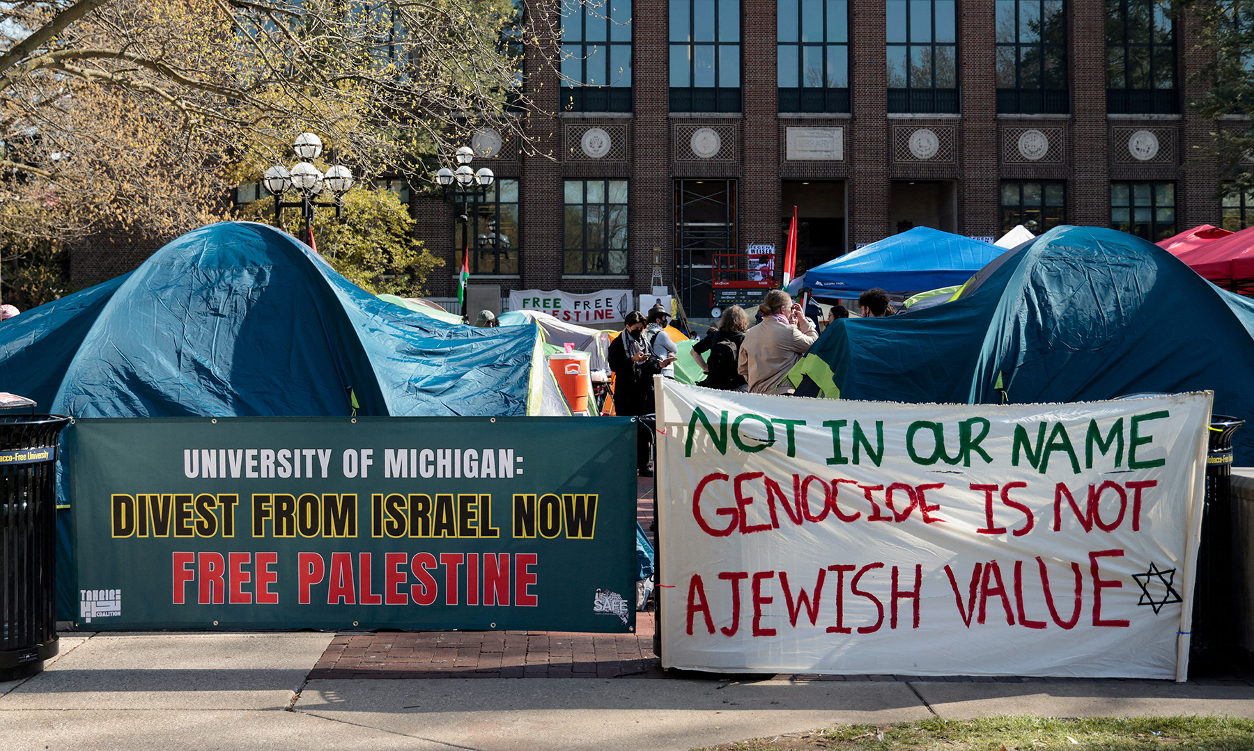 Image for Protesters Place Fake Bloody Corpses at Home of University of Michigan Official