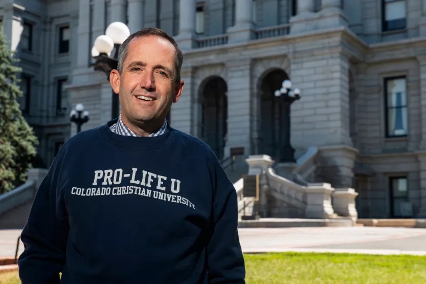 A photo of Jeffrey Hunt wearing his "Pro-Life U" sweatshirt.