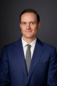 Headshot of FIRE attorney Greg Greubel