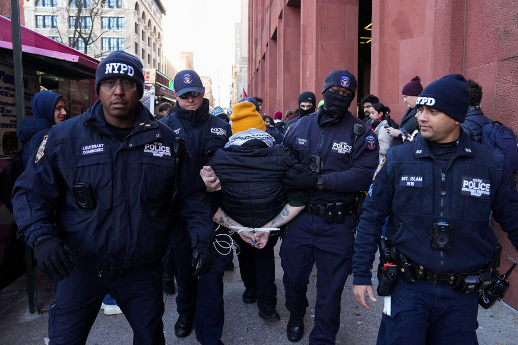 Students and pro-Palestinian supporters protest outside of New York University (NYU) campus