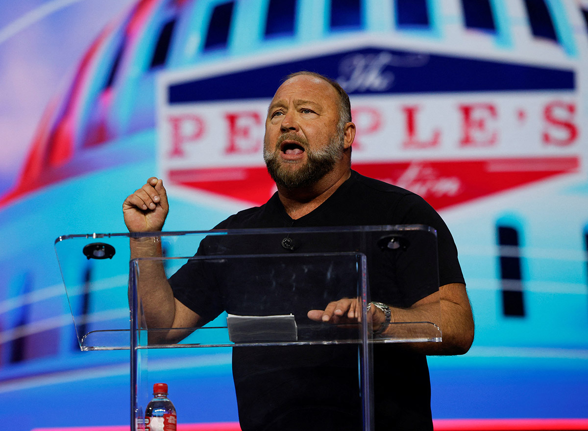 Far-right radio host Alex Jones speaks at an event held by the national conservative political movement, 'Turning Point' in Detroit