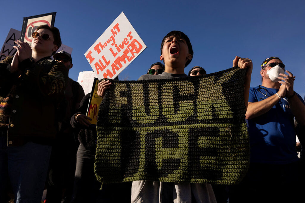 Demonstrators take part in an "ICE OUT" protest in Denver, Colorado, U.S