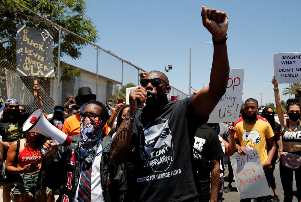 Protest in support of Colin Kaepernick and against police brutality and racial inequality in the aftermath of the death in Minneapolis police custody of George Floyd, in Inglewood
