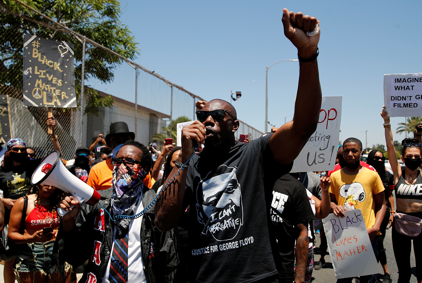 Protest in support of Colin Kaepernick and against police brutality and racial inequality in the aftermath of the death in Minneapolis police custody of George Floyd, in Inglewood